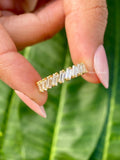 Half eternity baguette wedding band featuring lab grown diamonds set in 14K yellow gold