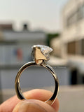 Marquise solitaire ring presented in a jewelry box ready for gifting