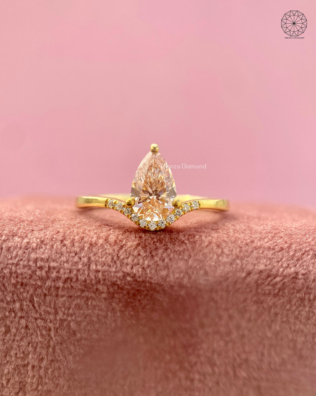 Pear lab grown diamond engagement ring featuring a teardrop solitaire in yellow gold