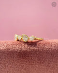 Close-up of the bezel set pear and Asscher cut diamonds arranged in a geometric cluster pattern