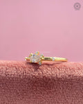 TrionzaDiamond pear diamond ring crafted with a minimalist floral cluster design