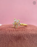Woman wearing the nature inspired floral cluster ring, close-up on her hand