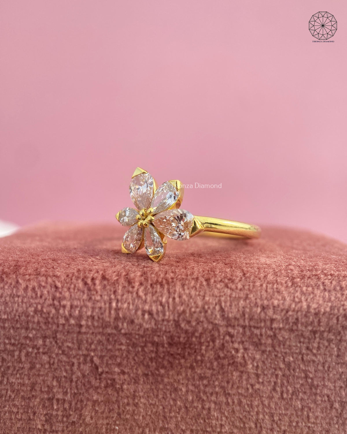 Woman wearing the nature inspired floral cluster ring, close-up on her hand