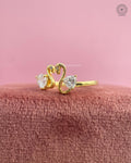Open front bypass ring crafted in yellow gold with a unique two stone layout