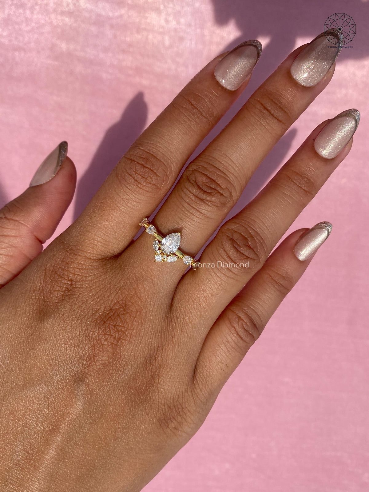 TrionzaDiamond pear diamond engagement ring designed for a modern vintage inspired bridal look
