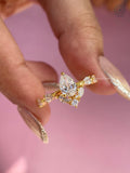 TrionzaDiamond engagement ring crafted with vintage inspired floral detailing