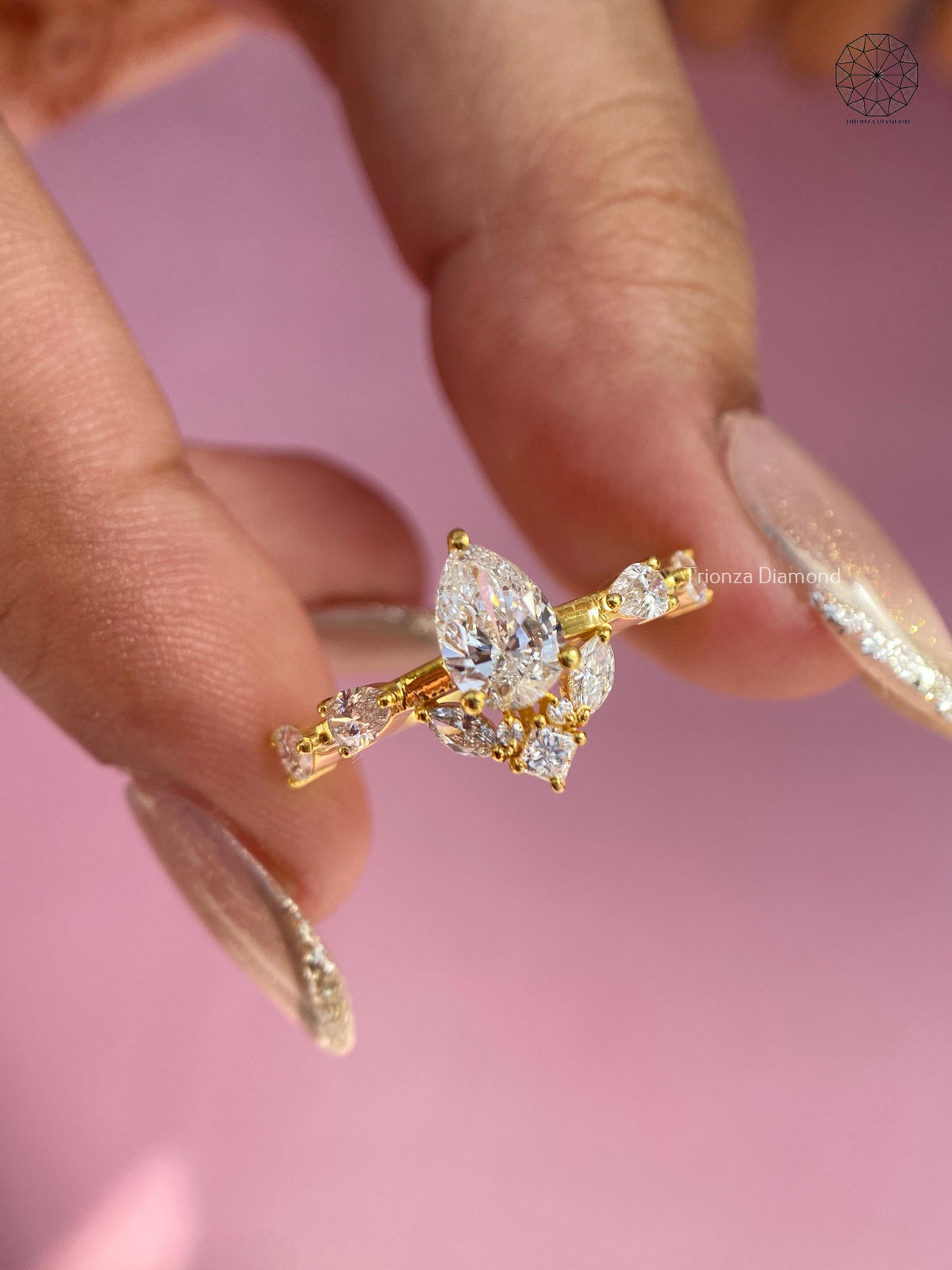 TrionzaDiamond engagement ring crafted with vintage inspired floral detailing
