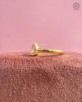 Low profile pear solitaire ring designed for everyday minimalist elegance