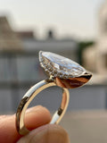 Model wearing the elongated marquise ring, highlighting its fine jewelry design