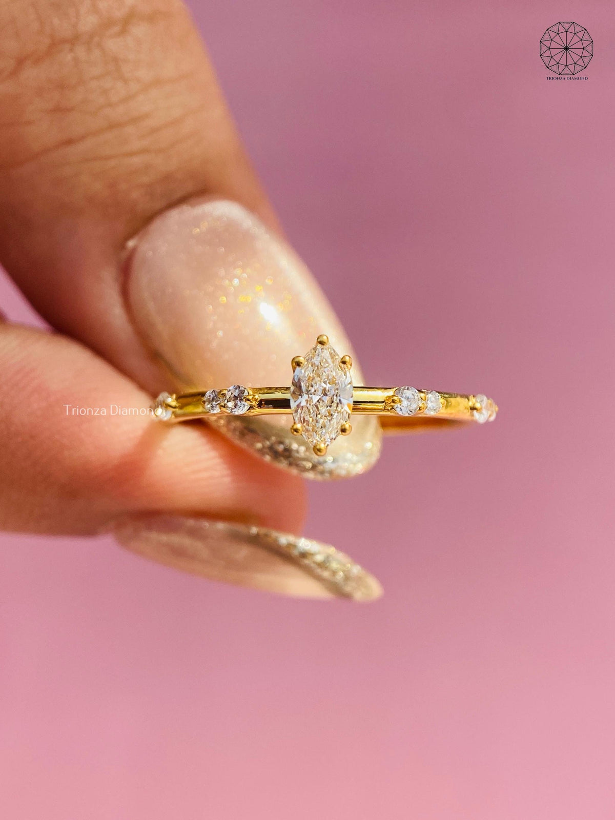 Handcrafted marquise diamond engagement ring styled as bridal jewelry and a gift for her