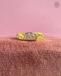 Half moon cut lab grown diamond ring featuring a yellow gold bezel signet setting