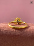 Yellow gold engagement ring designed with a modern romantic floral cluster setting