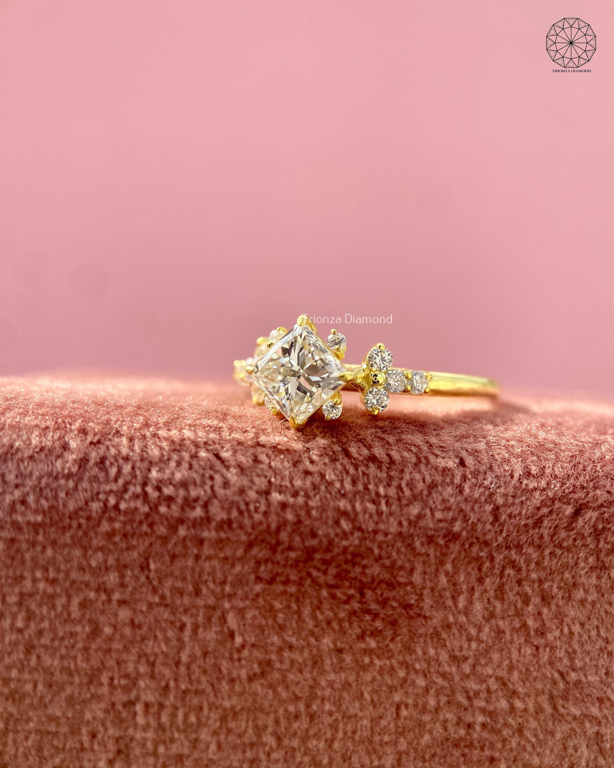 Close-up of the square center diamond surrounded by pave shoulder accents
