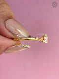 TrionzaDiamond engagement ring crafted with 18K yellow gold and a square cut center stone