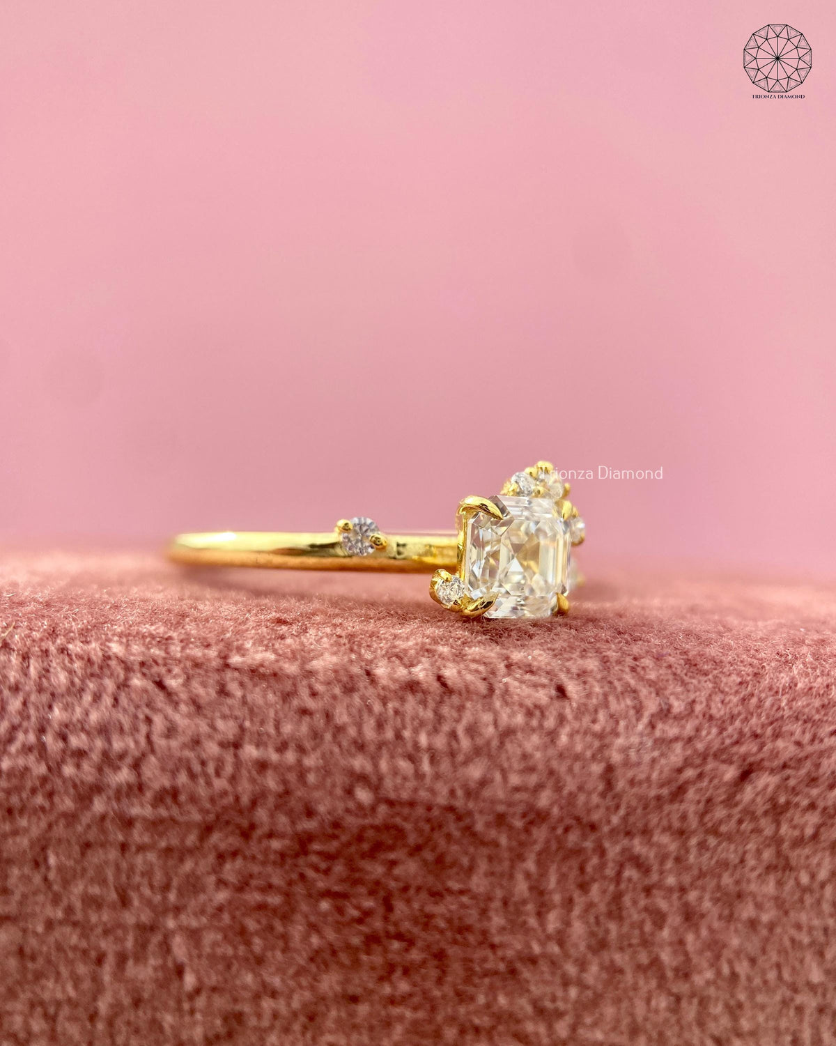 Close-up of the prong set asscher diamond showing the step-cut facets and natural glow