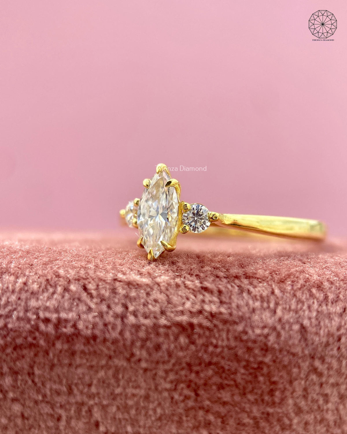 Marquise cut diamond ring shown from the side to reveal the prong set stones