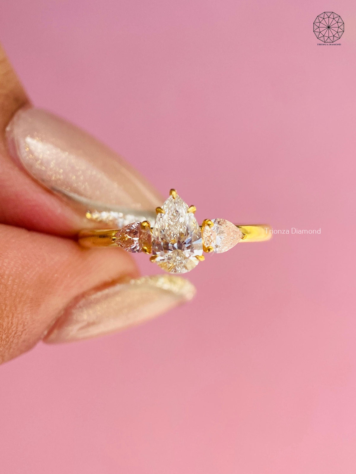 TrionzaDiamond pear diamond ring crafted with prong settings for lasting brilliance