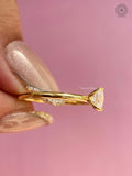 Woman wearing the oval bezel diamond ring for an everyday elegant look
