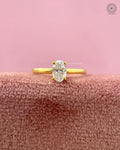Close-up of the 4 prong setting securely holding the 0.44 CT oval diamond
