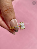 Side view of the oval cut diamond ring highlighting the prong set cluster design
