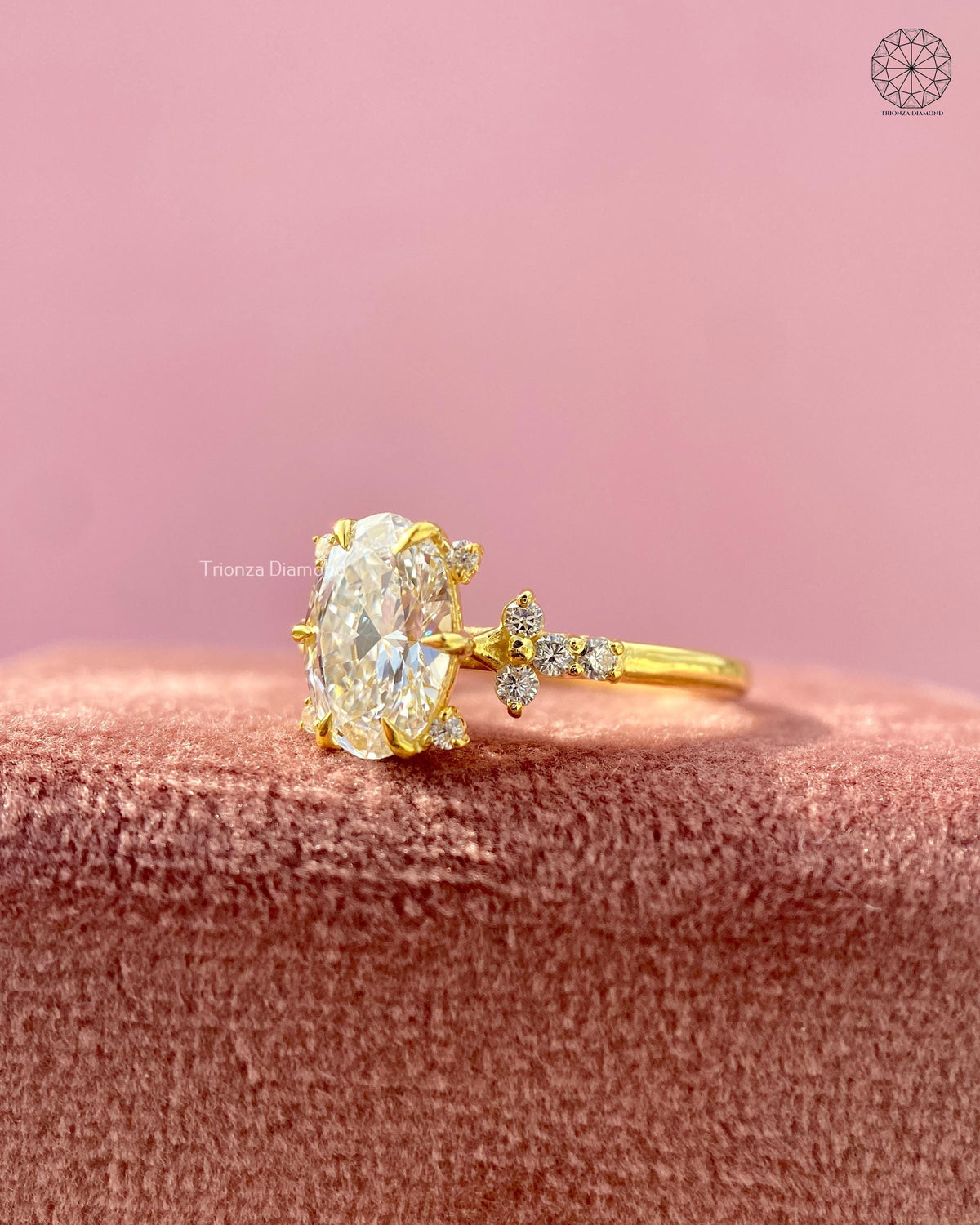 Three stone floral cluster ring displayed to highlight the pave band details