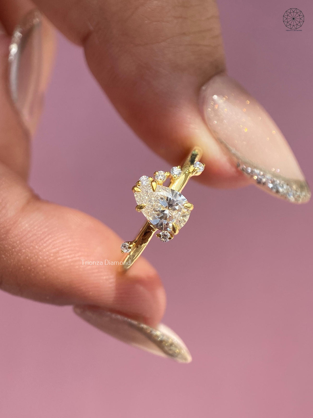 Prong set pear diamond solitaire ring offering a modern bridal styling option