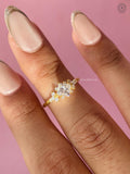 Princess cut diamond ring displayed to show its brilliance and symmetry