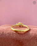 Woman wearing the princess cut diamond engagement ring, close-up on her hand