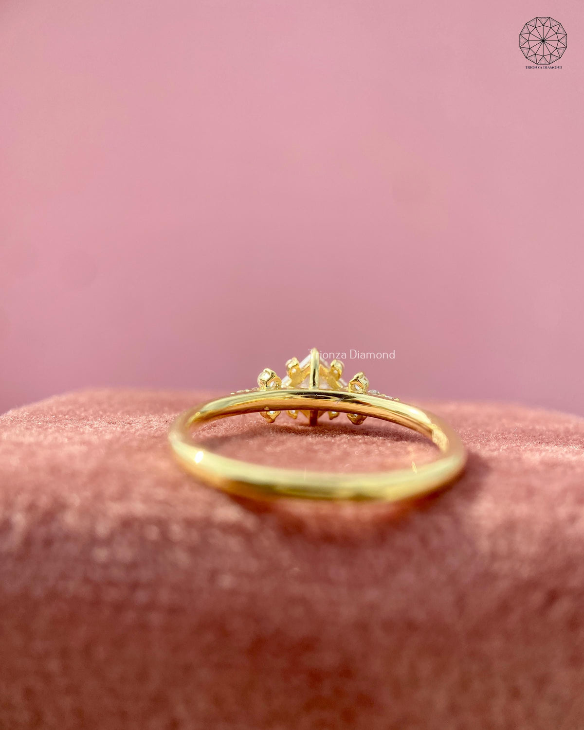 Woman wearing the princess cut diamond engagement ring, close-up on her hand