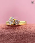 Close-up of the two stone prong setting showing the oval and round diamond pairing