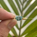 East West hexagon cut Montana teal sapphire ring handcrafted in gold with prong setting