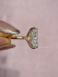 Woman wearing the radiant cut diamond engagement ring on her hand