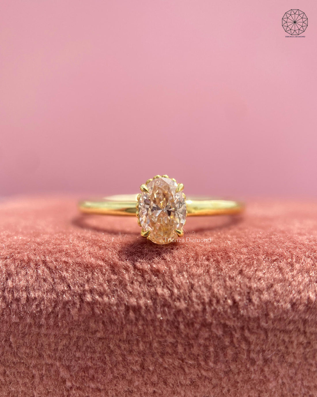 Oval cut lab grown diamond solitaire ring crafted in 14K yellow gold with a scalloped gallery