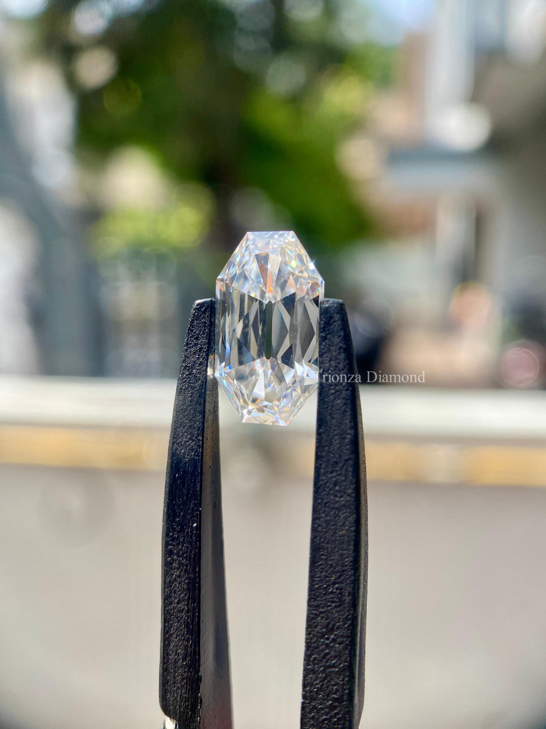 Oval cut lab grown diamond displaying excellent polish and natural brilliance in close-up view