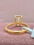 14k gold engagement ring displaying the D color VVS2 clarity radiant cut diamond