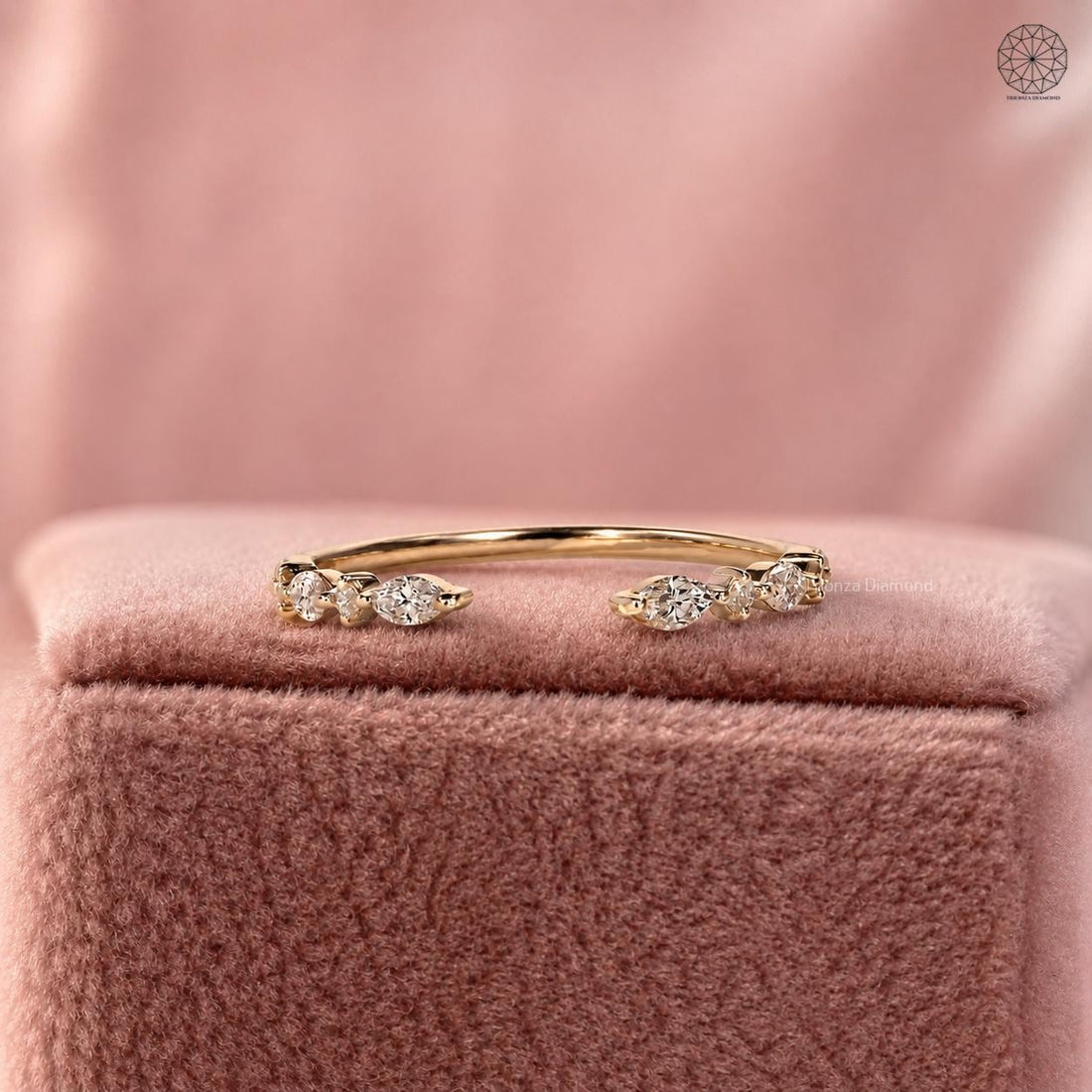 Thin open gap stacking ring featuring a marquise and round cut lab grown diamond design