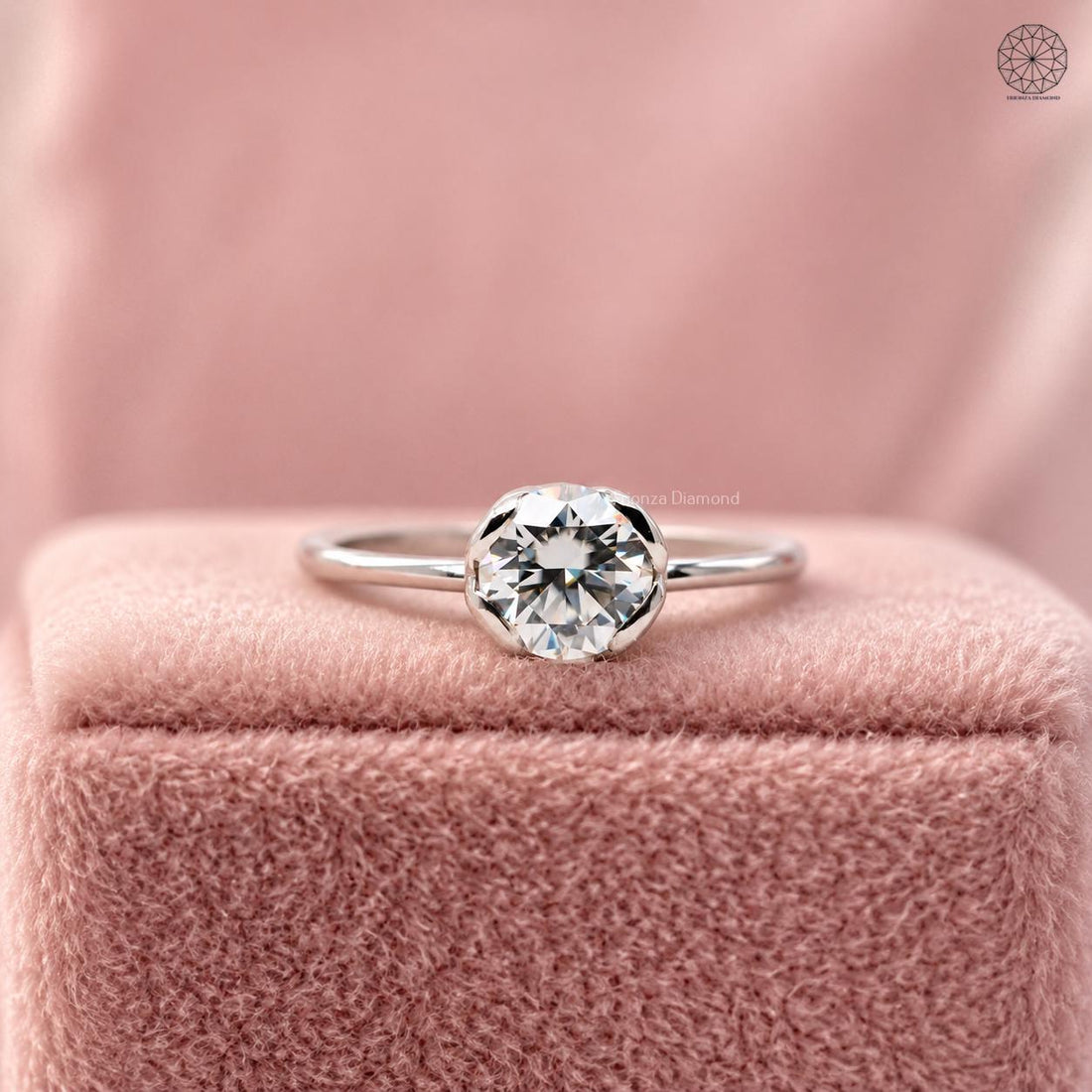 Round brilliant lab grown diamond solitaire ring set in a 14k white gold tulip basket setting