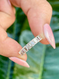 Handmade radiant cut diamond wedding band suited as a promise ring or anniversary ring