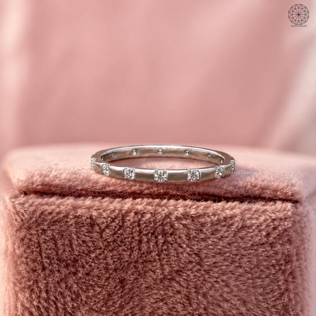 Full eternity wedding ring featuring 2mm round lab grown diamonds set around the band