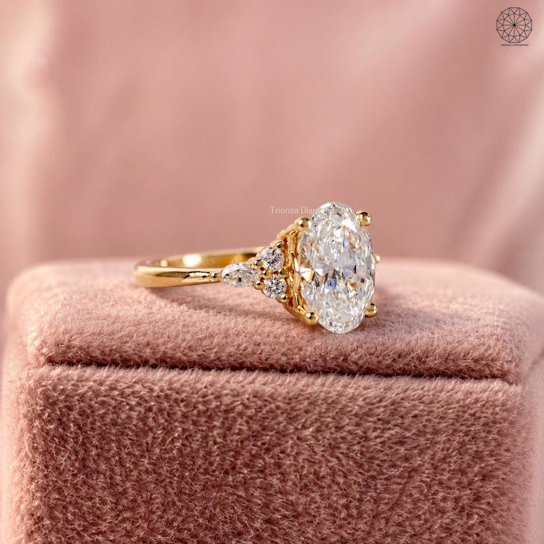 Oval lab grown diamond engagement ring featuring a cluster design with marquise and round side stones