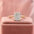 Radiant cut lab grown diamond engagement ring featuring a solitaire hidden halo design in 14K gold