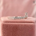 Marquise diamond ring displayed to show the EF color and VVS/VS clarity of the stones