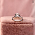 14K and 18K gold solitaire ring featuring a round lab grown diamond centerpiece
