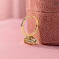 18K yellow gold engagement ring displayed to highlight its handmade craftsmanship