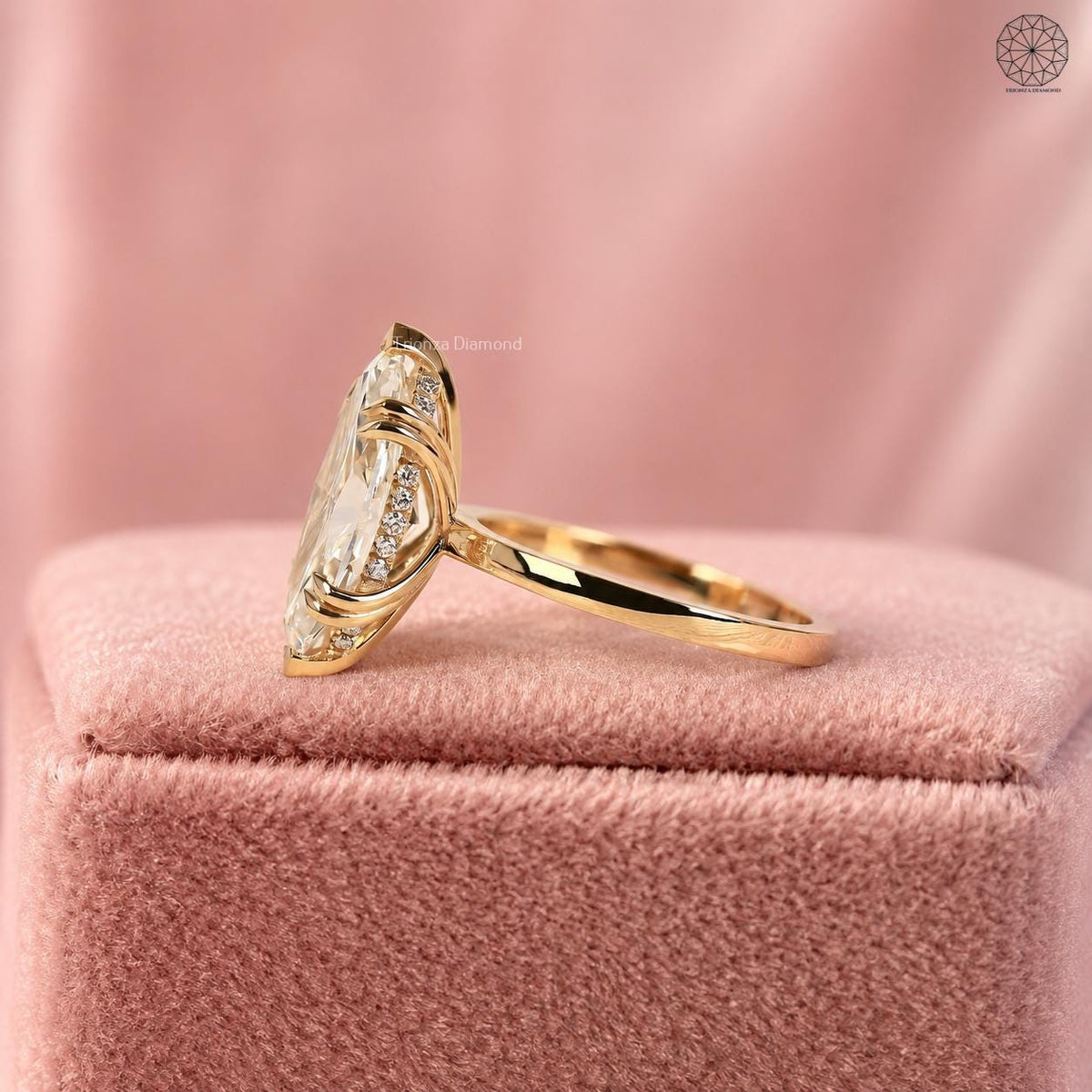 Marquise cut lab grown diamond engagement ring with hidden halo setting in 18K yellow gold