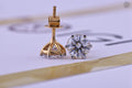 Woman wearing the round solitaire diamond stud earrings for an elegant look