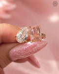 Toi et moi ring displayed to highlight the pink radiant diamond color and VVS/VS clarity
