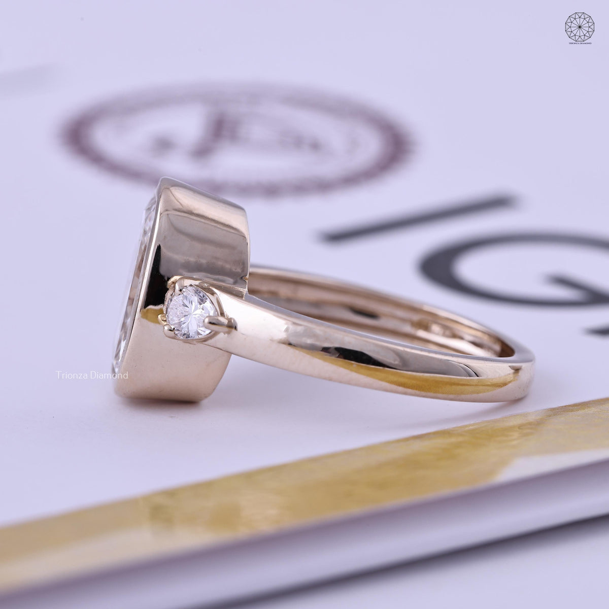 Woman wearing the cushion cut diamond ring, close-up view on her hand