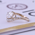 Woman wearing the oval solitaire engagement ring on her hand for a natural look