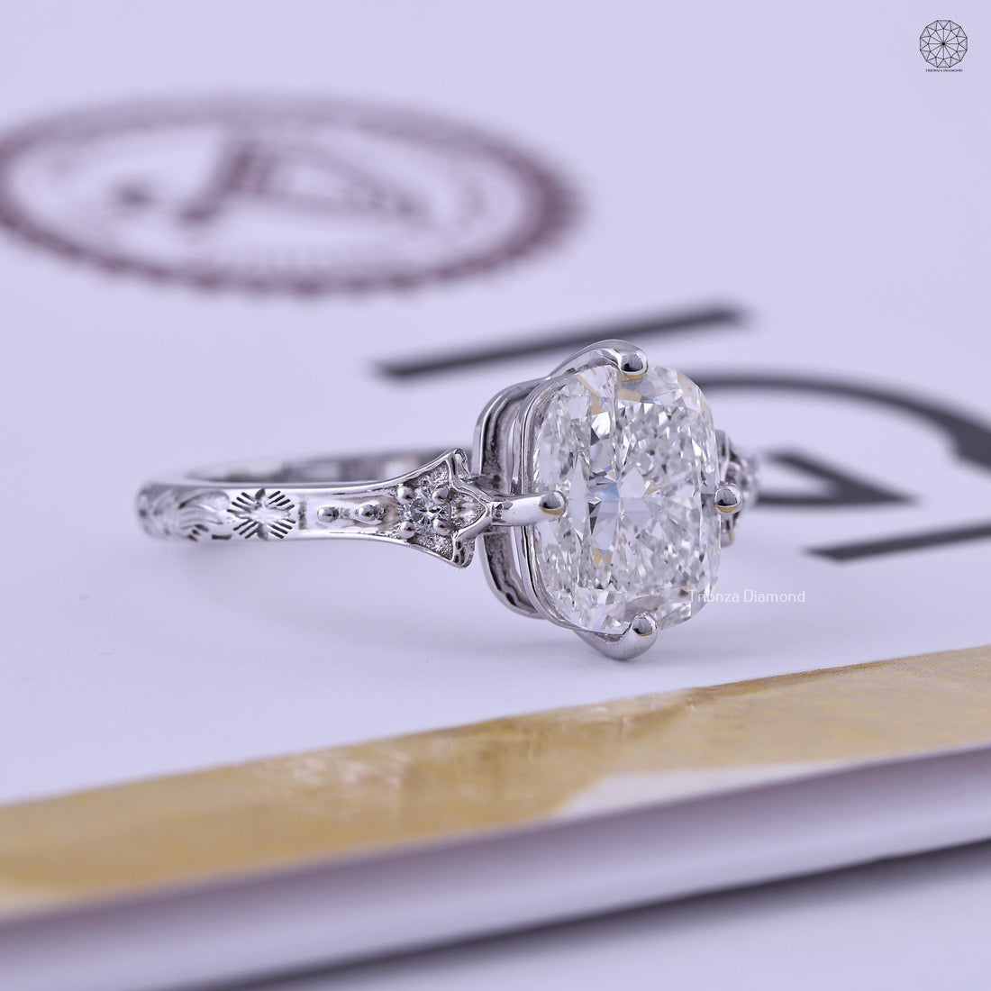 Elongated cushion cut lab grown diamond engagement ring with vintage floral filigree in 14K gold